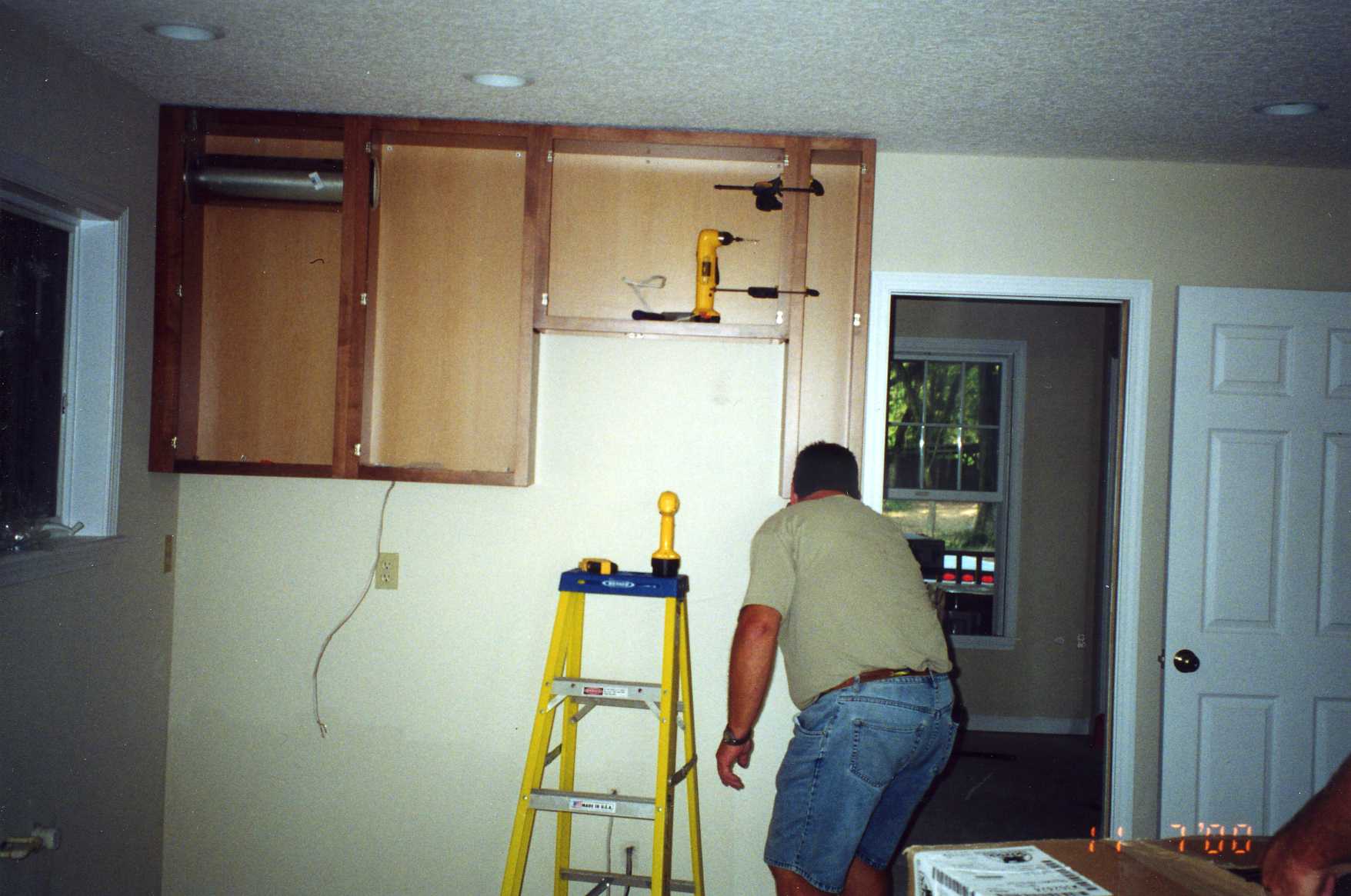 Installing Kitchen cabinets.jpg